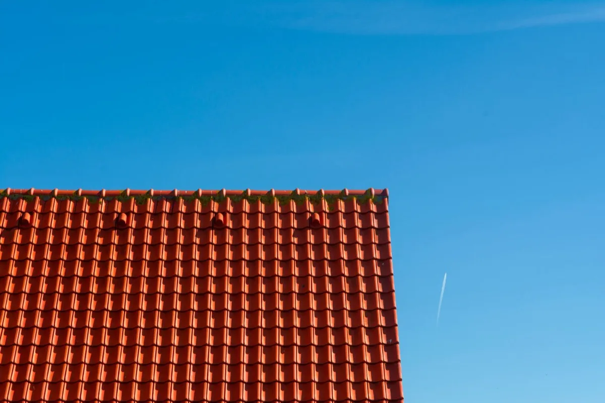 Tile roof gable in full sun, the kind of exposure that sets roof life in Rome, GA